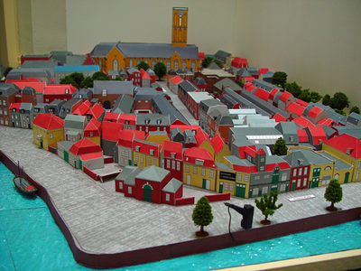 878191 Afbeelding van een deel van de 'kale' maquette van het noordoostelijk deel van ‘Wijk C anno 1925’ , gemaakt door ...